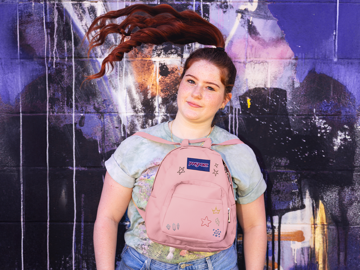 jansport backpack on women Slouch Pack - Fully Padded Back Panel - Comfortable and Ideal Storage - Misty Rose Mesh Pack Backpack JanSport | Urban Outfitters